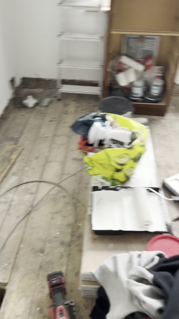 Tracing an electrical fault under lifted floorboards